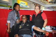 Umhlobo Wenene FM’s breakfast show DJ, Putco Mafani (centre), gives blood during the South African National Blood Service drive at Pier 14 last week. Keeping an eye on the patient are the radio station’s portfolio sales manager Phelisa Silekwa (left) and SANBS registered nurse Patricia Gallant (right). Photo: Supplied